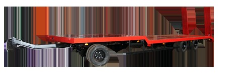 Трехосный низкорамный прицеп трал г/п  25 тонн с заездными трапами и поворотной осью, для перевозки спецтехники и ГНБ