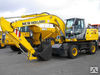 Колесный экскаватор New Holland Колесный экскаватор New Holland