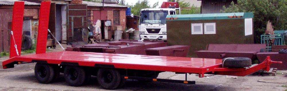 Трехосный прицеп трал с заездными трапами г/п  20 тонн, для перевозки спецтехники и ГНБ